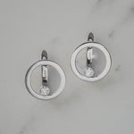 Lever back earrings in 14K white gold decorated with diamond-cut zirconium.