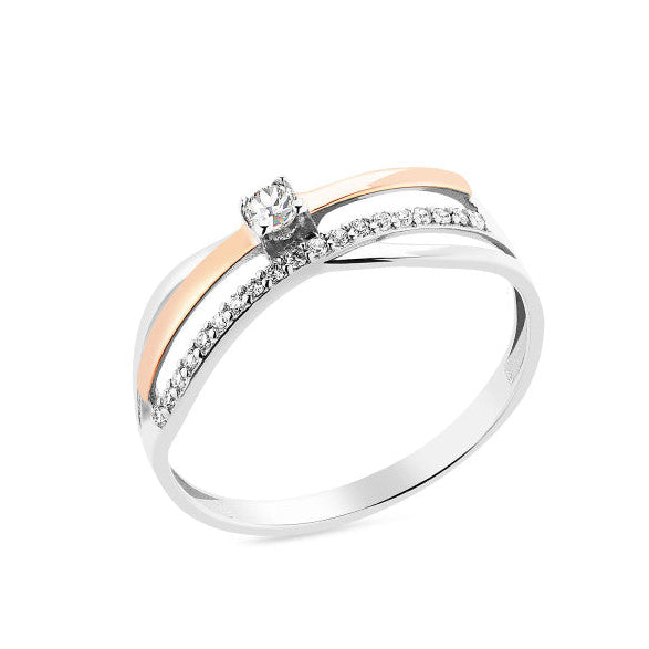 Two-tone ring with a cubic zirconia on white background
