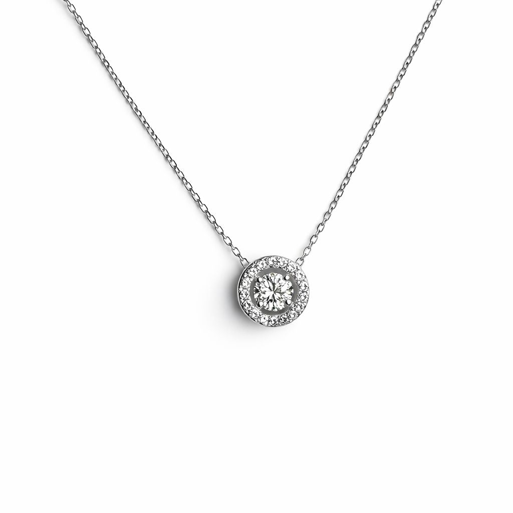 Gold necklace with cubic zirconia on a white background