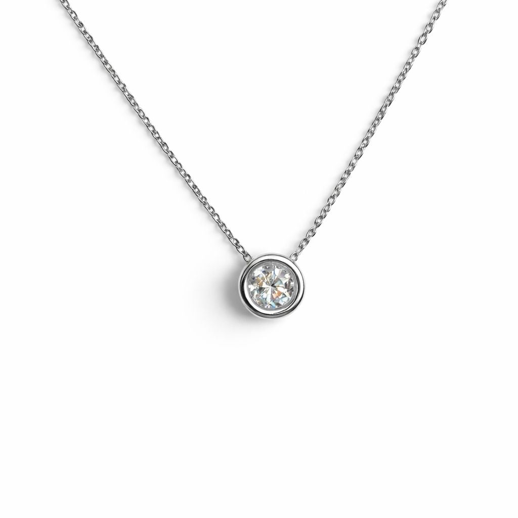 Gold necklace with cubic zirconia  on a white background