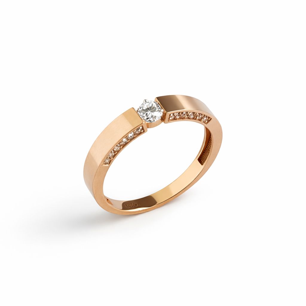 Rose gold ring with cubic zirconia on a white background