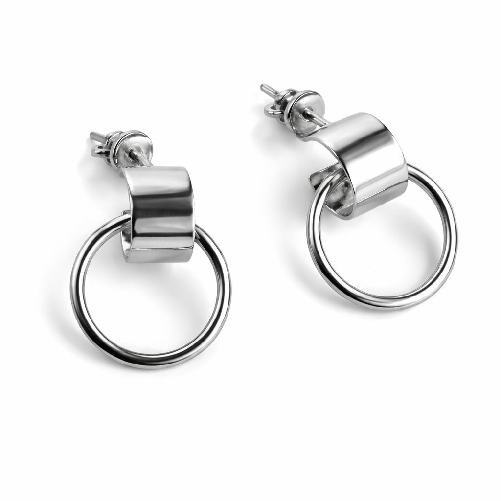 Pair of sterling silver drop earrings on a white background