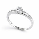 Sterling silver ring with cubic zirconia on a white background