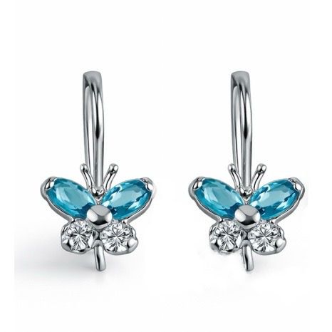 Butterfly sterling silver  earrings with cubic zirconia on a white background