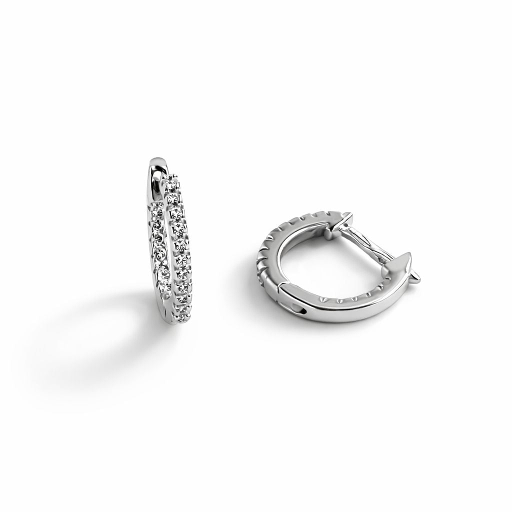Sterling silver hoop earrings with cubic zirconia on a white background