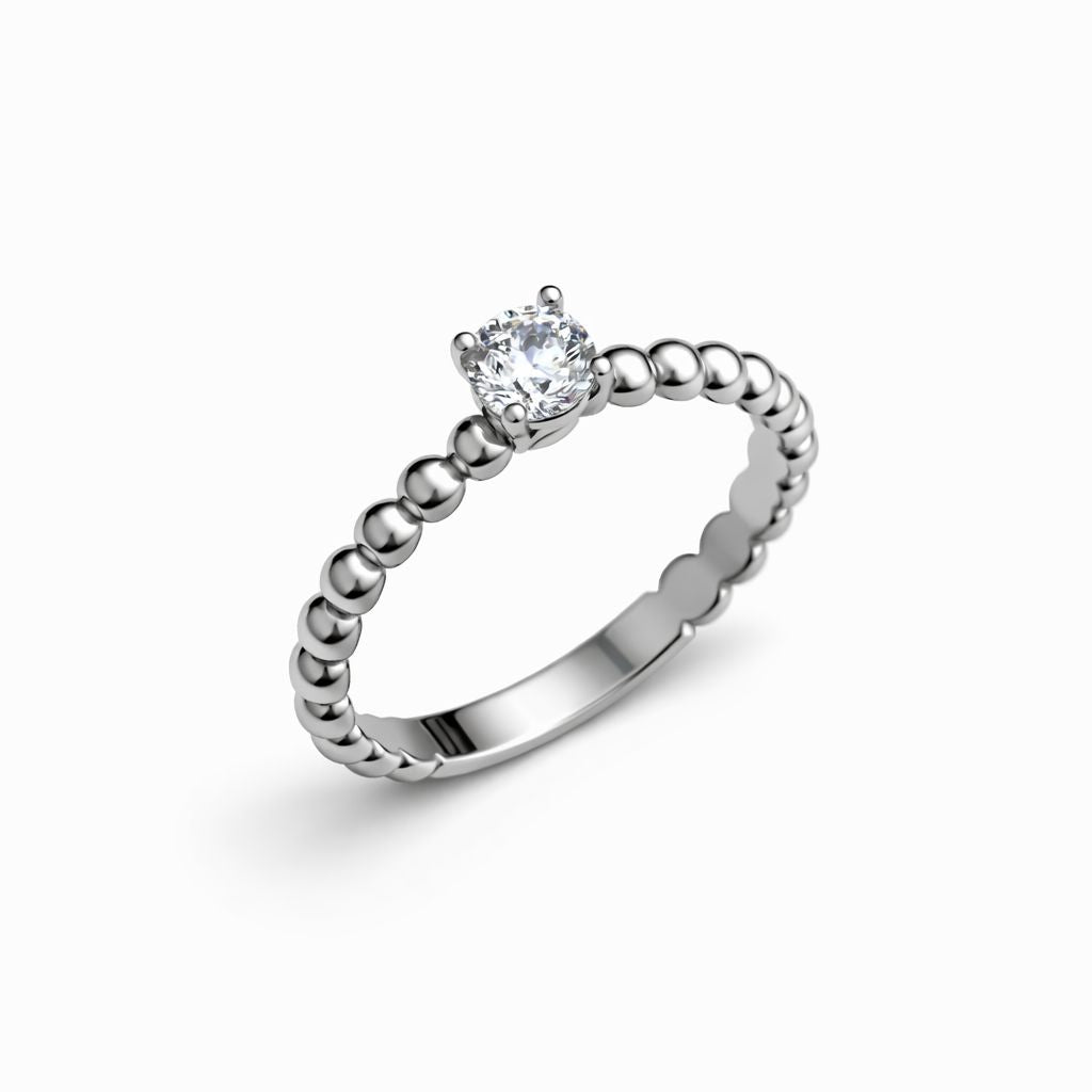 Sterling silver ring with cubic zirconia on a white background