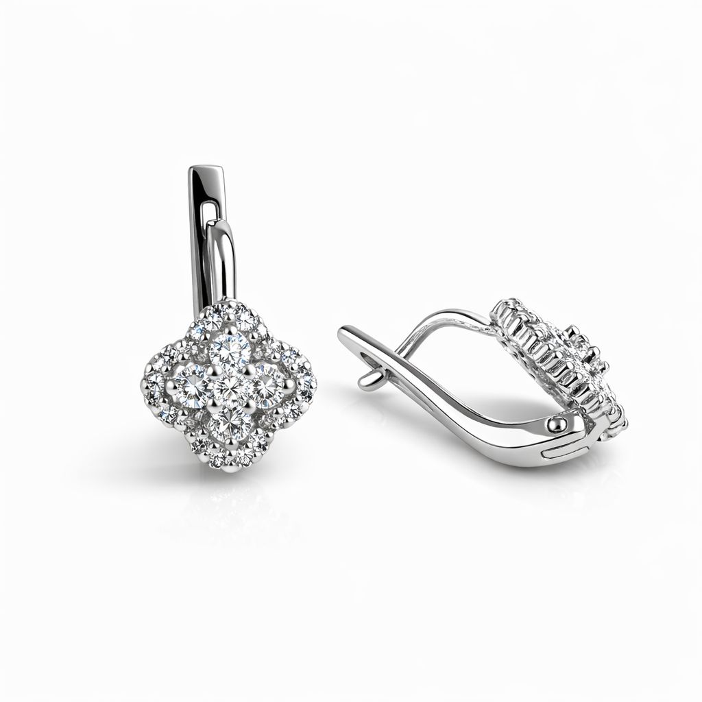 Pair of sterling silver earrings with clear cubic zirconia  on a white background