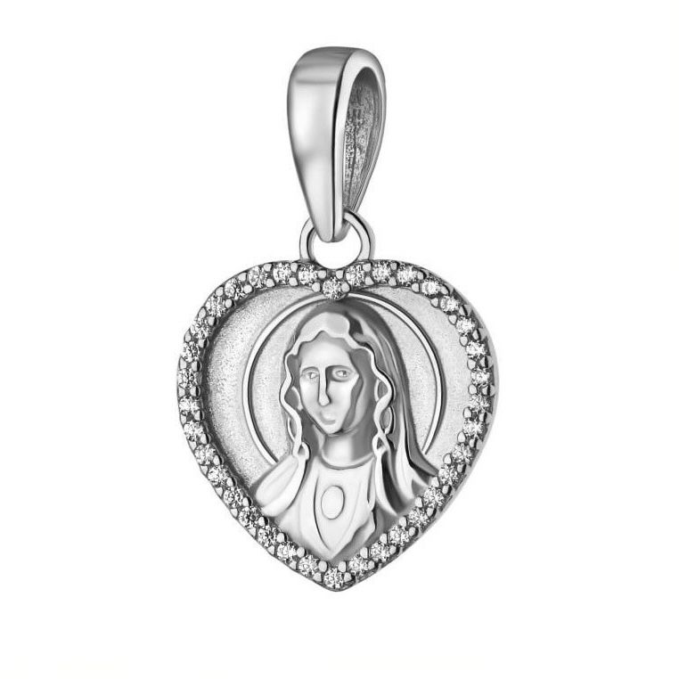 Silver pendant with heart design and face engraving on a white background