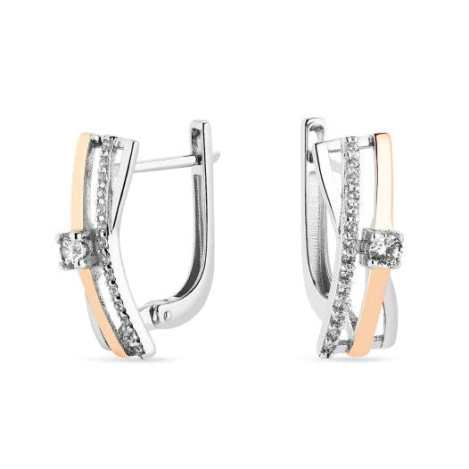 Pair of silver hoop earrings on a white background