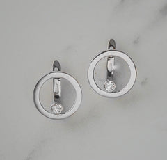 Lever back earrings in 14K white gold decorated with diamond-cut zirconium.